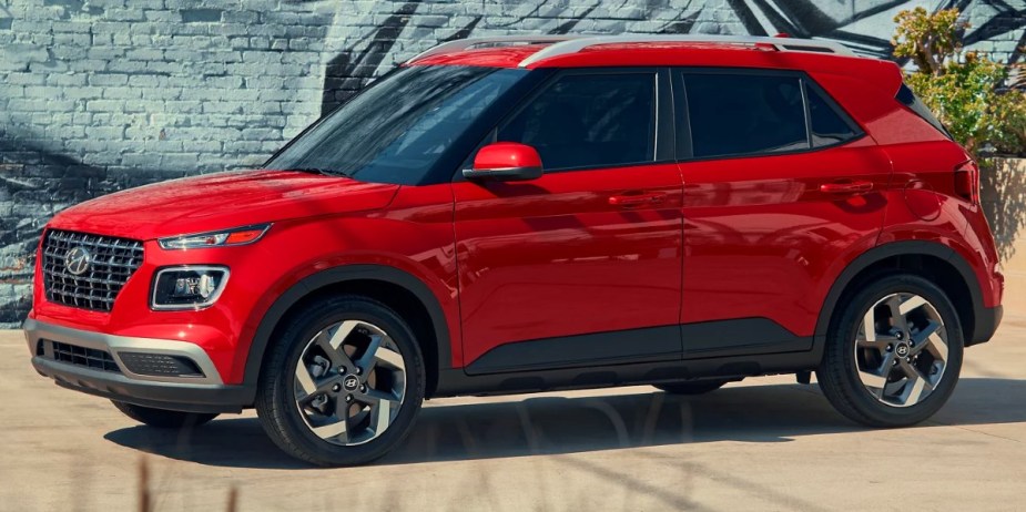 A red 2023 Hyundai Venue subcompact SUV. 