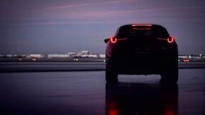 A 2023 Mazda CX-30 parked outdoors in the shadows.