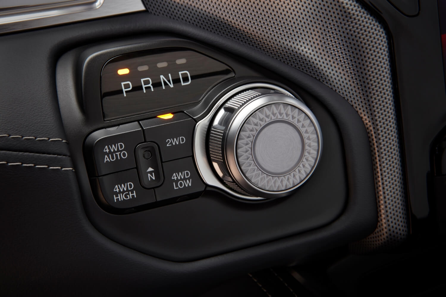 Detail shot of a decorated shift knob for the eight-speed automatic in the Ram 1500 Limited truck.