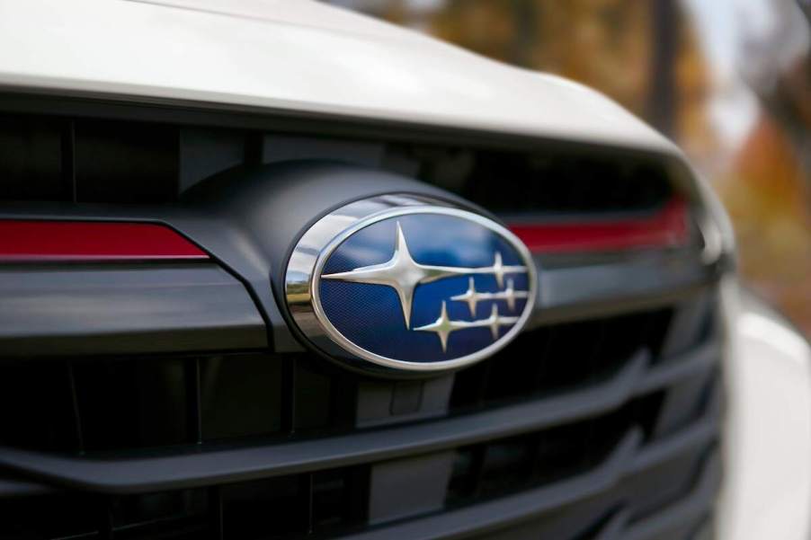 A 2023 Subaru Legacy, one of the best Subaru sedans, focusing on the logo on the grille.