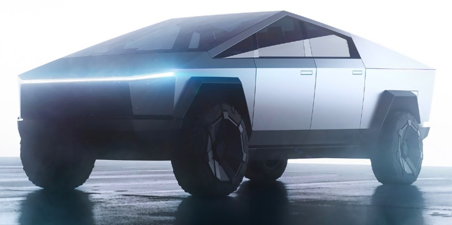 A gray 2023 Tesla Cybertruck electric pickup truck is parked. 