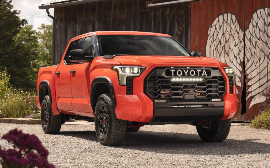 The 2023 Toyota Tundra parked near a home