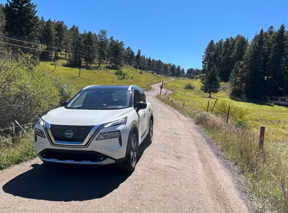 2023 Nissan Rogue front view on a dirt road