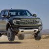 The 2024 Ford Ranger Raptor jumping through the air. This is the base for the truck Ford is sending to compete in Dakar 2024.