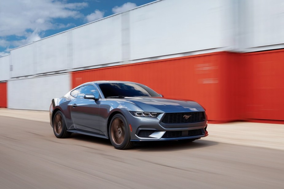 A 2024 Ford Mustang EcoBoost Premium blasts through a harbor. 