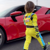 3-year-old walking up to a red Ferrari SF90