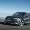 A silver Audi A8, which is one of Audi's best sedans, driving down a highway.