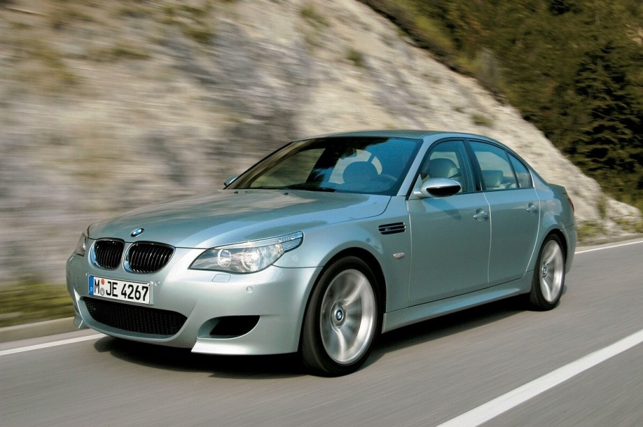 A 2010 BMW M5 luxury performance car shows off its silver paintwork. 