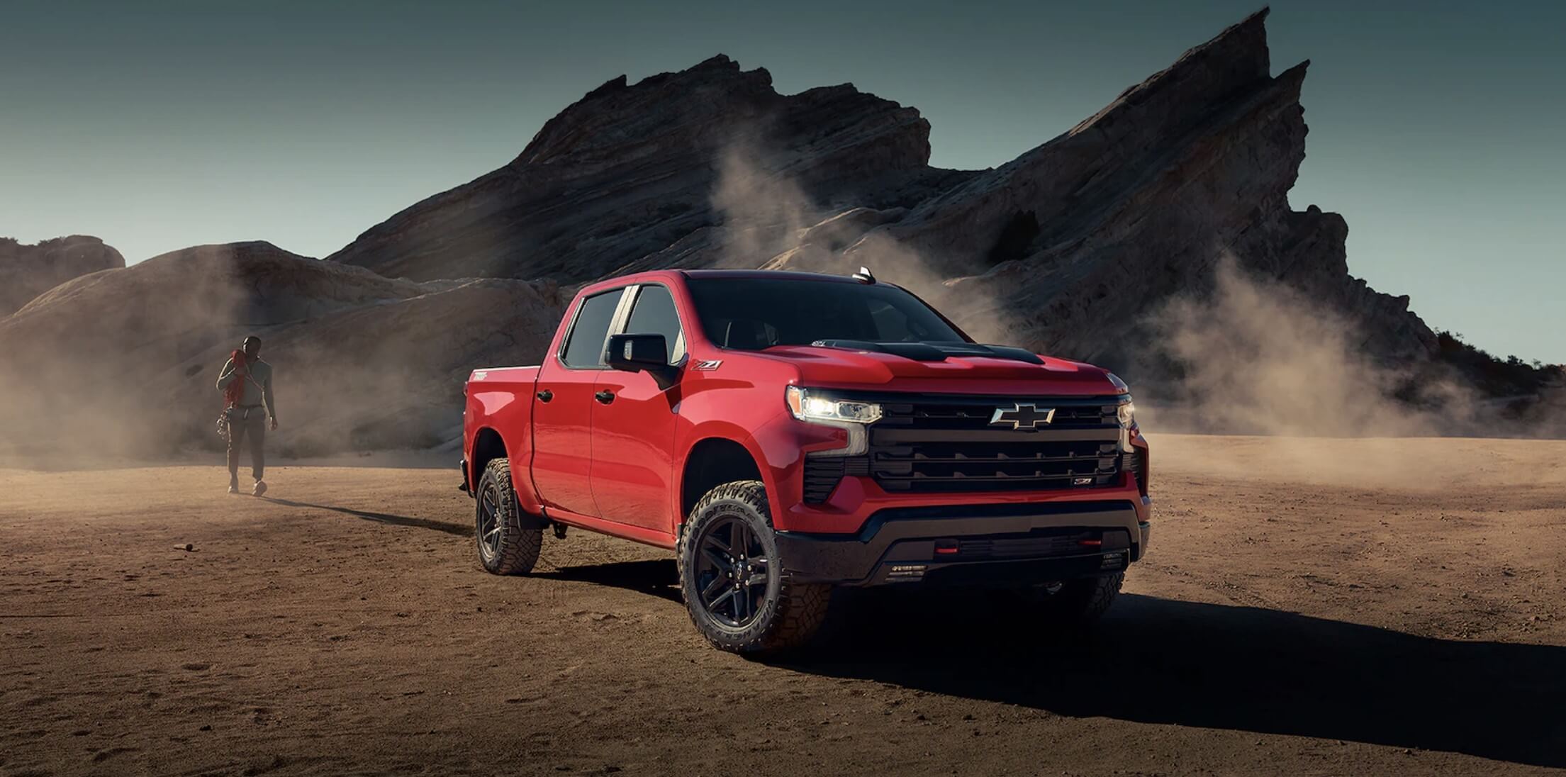 The Chevrolet Silverado 1500 parked in the dirt