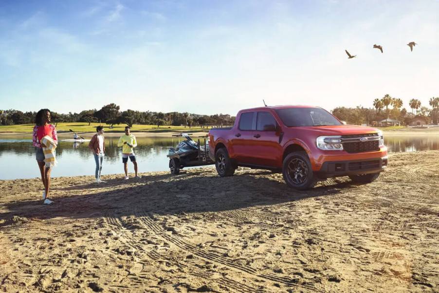 As a truck with a towing recall, the 2023 Ford Maverick sits at a beach.