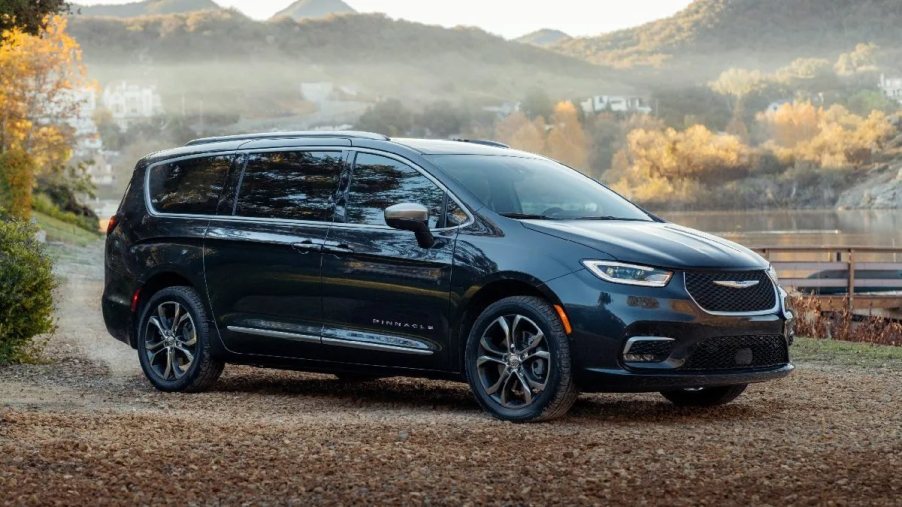 Front angle view of black 2023 Chrysler Pacifica Plug-In Hybrid minivan