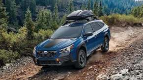 Front angle view of blue 2023 Subaru Outback crossover SUV