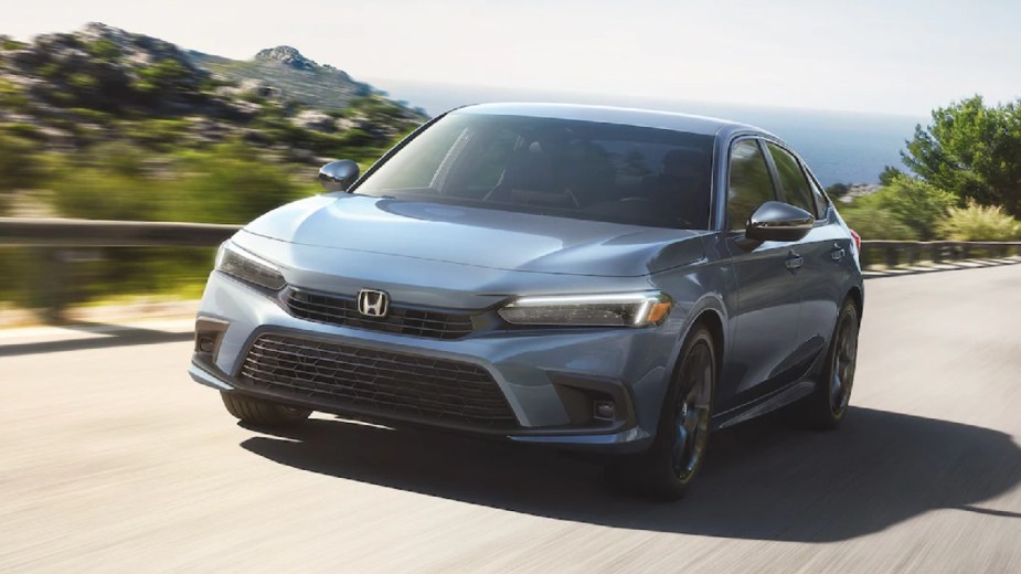 Front angle view of gray 2023 Honda Civic compact car