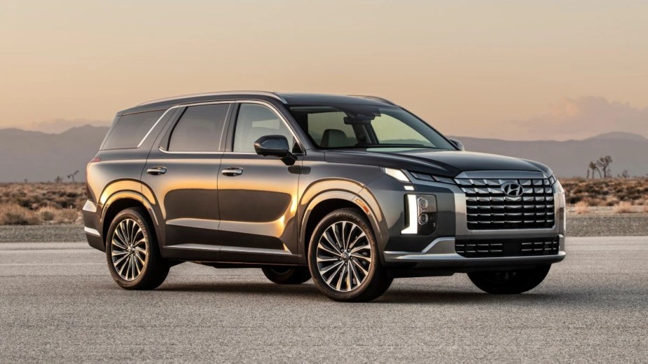 Front angle view of gray 2023 Hyundai Palisade midsize SUV 