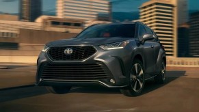 Front angle view of gray 2023 Toyota Highlander Hybrid midsize SUV