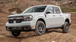 Front angle view of white 2023 Ford Maverick compact pickup truck