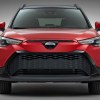 Front view of red 2023 Toyota Corolla Cross crossover SUV