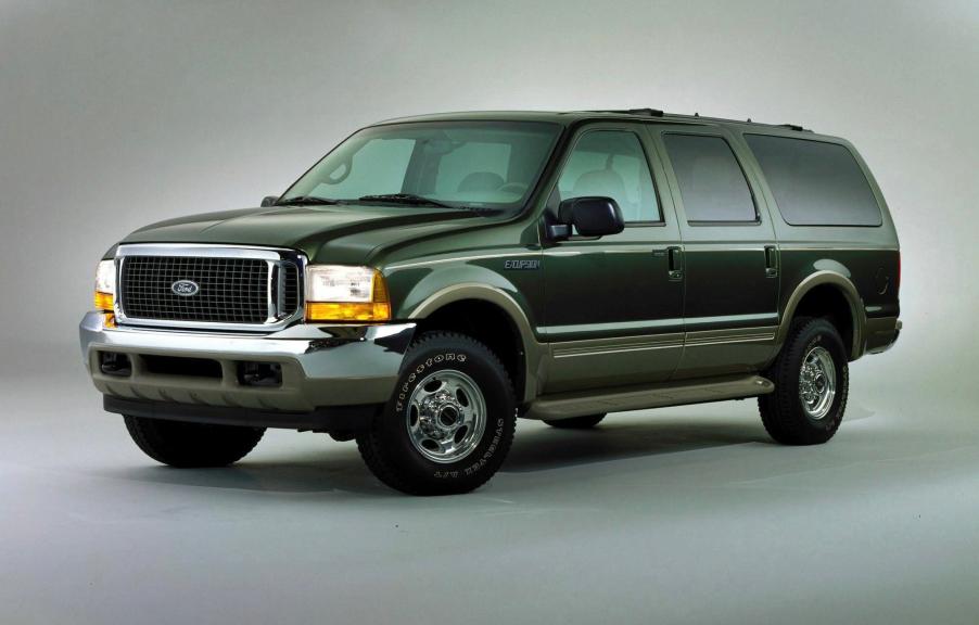 A green Ford Excursion