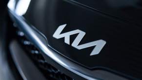 A black Kia with the Kia logo displayed. The Kia Telluride is the only Kia with a top safety pick nod.