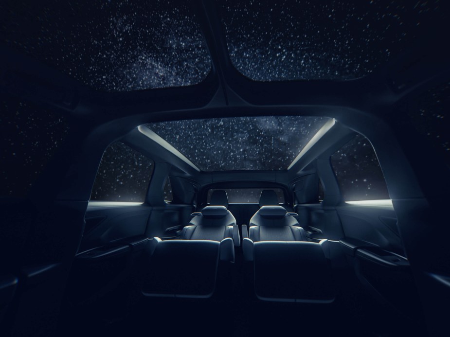 Interior perspective of latest Lucid Gravity rendering looking out of glass canopy at stars. 