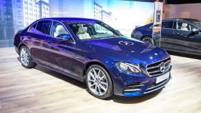 A blue Mercedes-Benz E-Class sedan, which is one of the top ranked Mercedes-Benz vehicles.