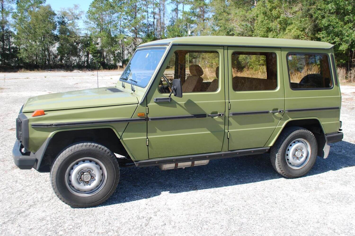 Green Mercedes G Wagon by Puch with a tan interior.