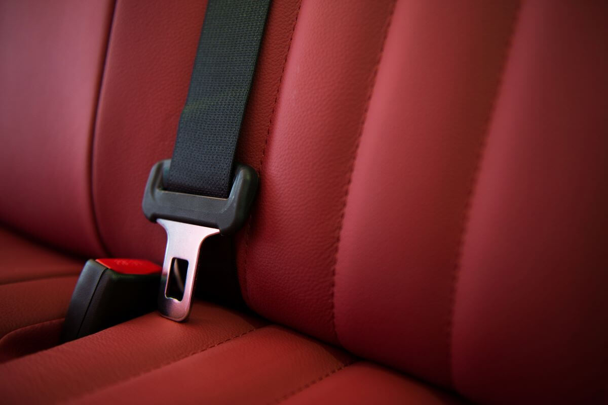 An unlatched car seat belt inside a Mitsuoka Motor model at a factory in Toyama, Japan