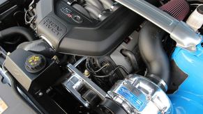 A ProCharger system like this one on a Coyote Ford Mustang takes up less space than a high-horsepower roots supercharger.