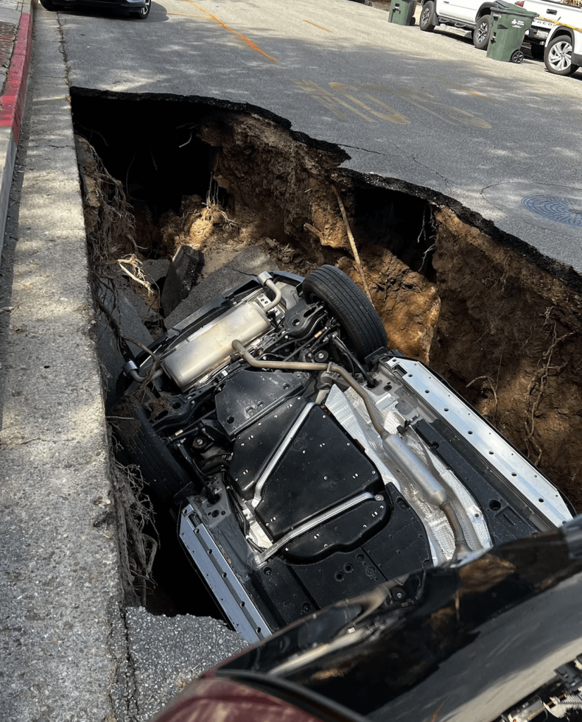 1 2022 Toyota RAV4 in a sinkhole