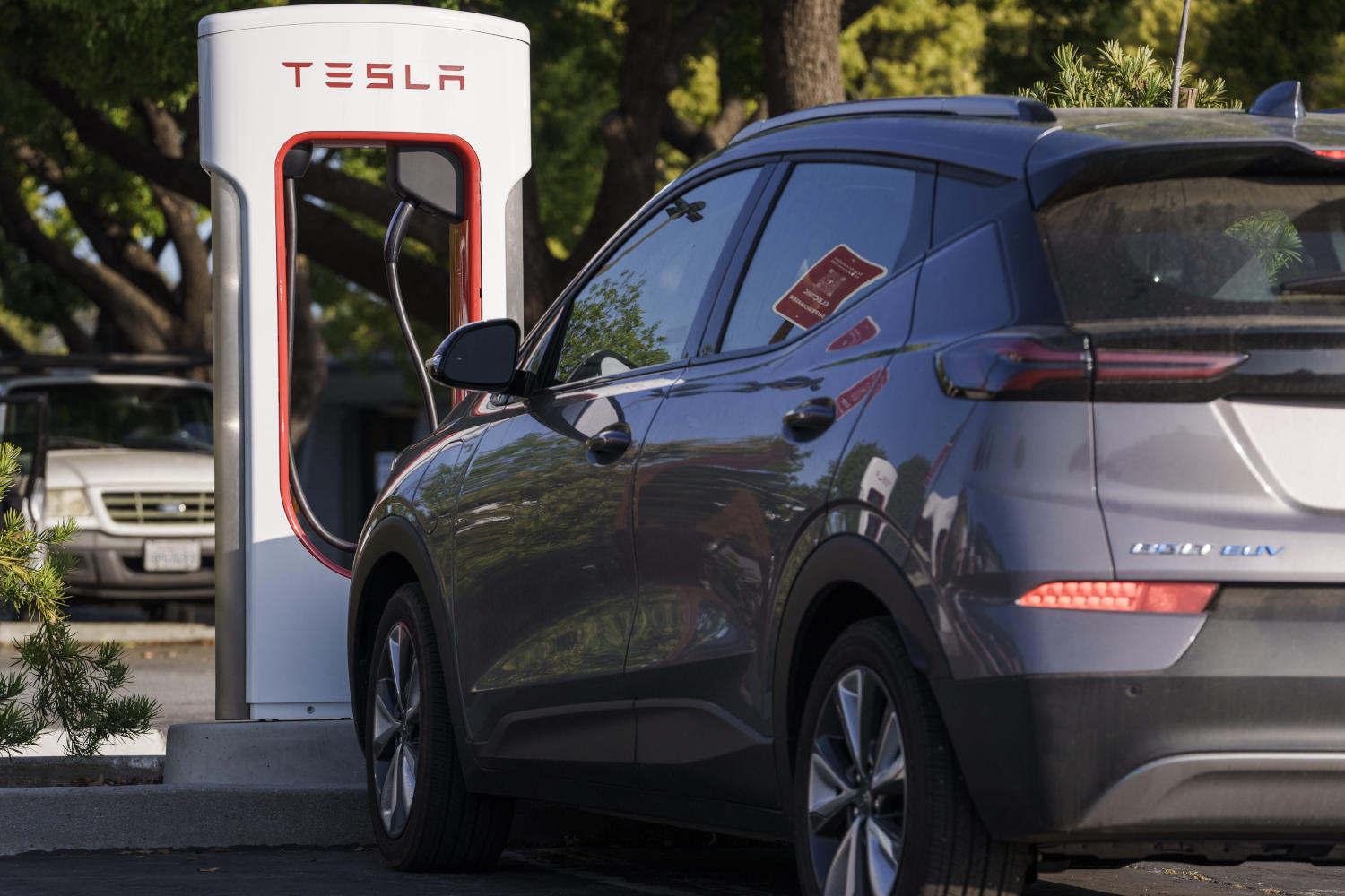 The Tesla Magic Dock charging a non-Tesla EV