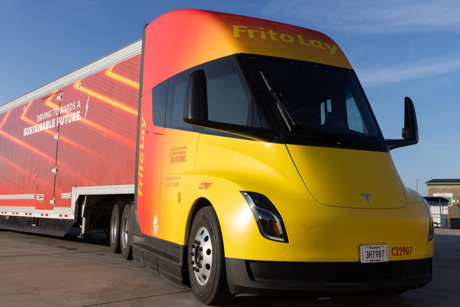 Frito Lay's promo photo of its repainted Tesla semi truck pulling a Dorito's trailer.