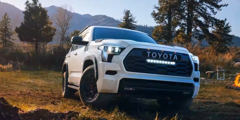 A white 2023 Toyota Sequoia full-size SUV. 