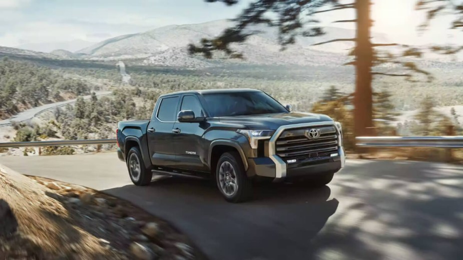 The 2023 Toyota Tundra is driving down the road, it does have a recall for its tonneau cover.