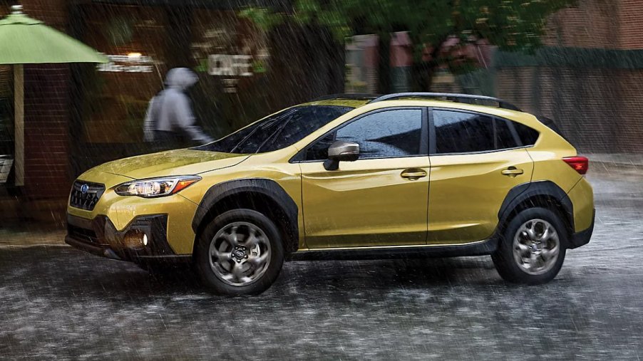 Yellow 2023 Subaru Crosstrek subcompact crossover SUV, most reliable Subaru car, says Consumer Reports, not Impreza or Forester