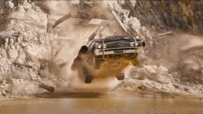 A 1967 Chevrolet El Camino drives through a mineshaft during an action sequence in Fast and Furious 10.