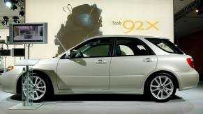 A side profile of a Saab 9-2X hatchback model on display at the 2004 New York International Auto Show