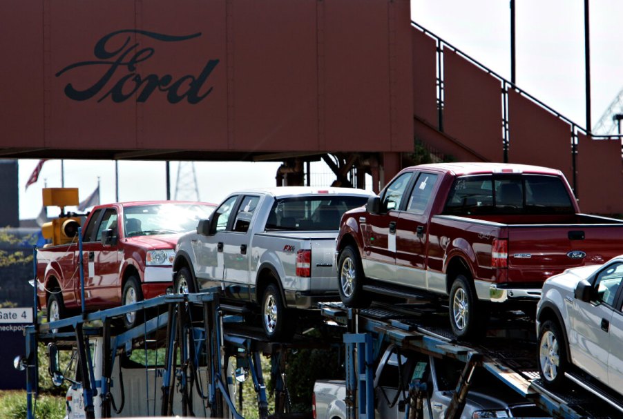 A group of 2006 Ford F-150 trucks being shipped.