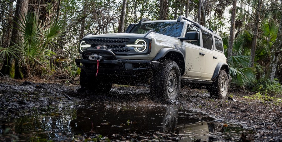 The 2022 Ford Bronco Everglades off-roading through swampy conditions