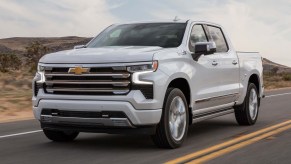 The 2023 Chevy Silverado Duramax Diesel driving on the road