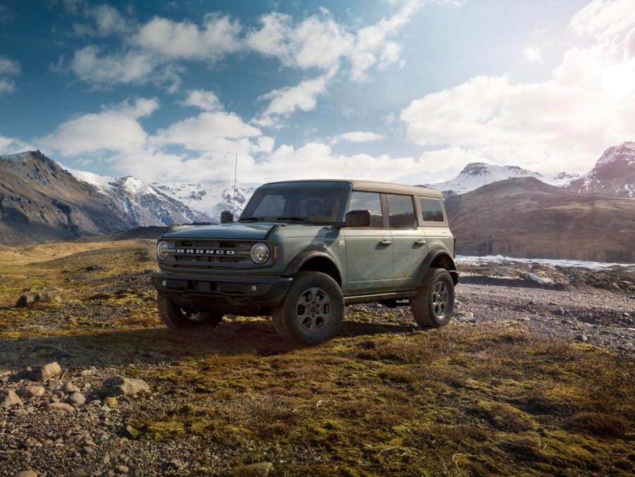 Grey 2023 Ford Bronco in front of mountain background.