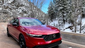 2023 Honda Accord Hybrid front view in a canyon.