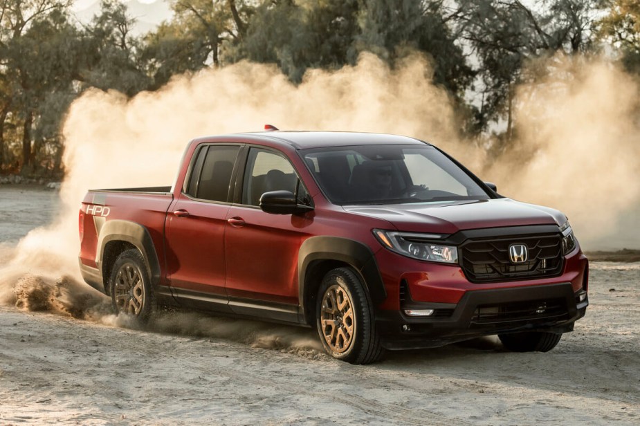 The 2023 Honda Ridgeline kicking up dirt 