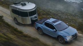 The 2023 Hyundai Santa Cruz towing a trailer