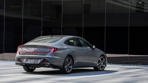 A gray 2023 Hyundai Sonata Hybrid shows off its rear-end styling.