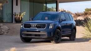 A blue 2023 Kia Telluride midsize SUV.