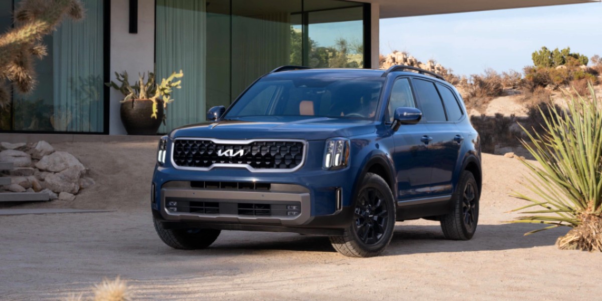 A blue 2023 Kia Telluride midsize SUV.