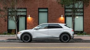 The 2023 Hyundai Ioniq 5 parked on a city street. The Ioniq 5 is one of the best electric SUVs you can get right now.