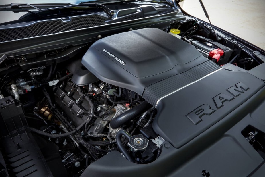 The engine bay of a Ram 1500 with a 5.7-liter V8 engine.