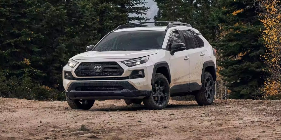 A white 2023 Toyota RAV4 small SUV is parked outdoors. 