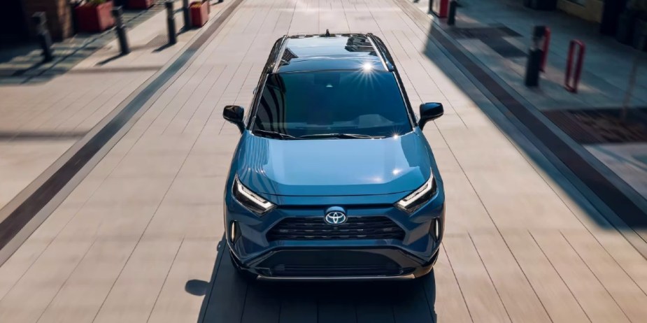 A blue 2023 Toyota RAV4 Hybrid small hybrid SUV. 